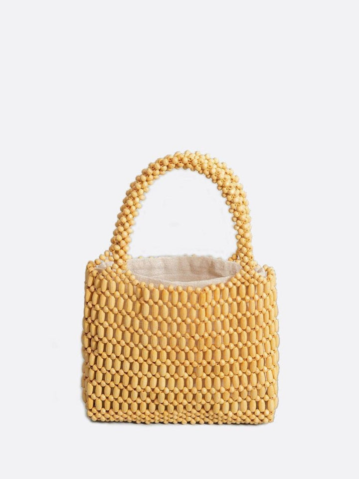 Sac à main en perles de bois jaune moutarde